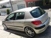Peugeot 307 rebaixado com rodas devino aro 20